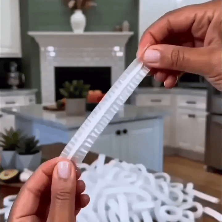 Hands stretching an elastic food cover into place